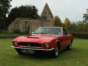 A 1972 Aston Martin AM Vantage saloon (LNV 756L) photographed at Sudeley Castle, 5 October 2014.