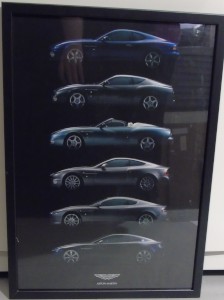 Framed poster of all the Aston Martin models from DB7 to the V8 Vantage