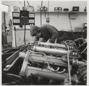 Photograph of engineer working on engine of DBSV8/10038/R