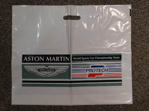White Plastic bag with 'Aston Martin' and 'Protech' logos