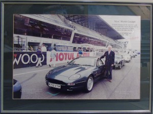 Large framed photograph of Mort Morris Goodall next to a DB7 at the start of the Le Mans 1995